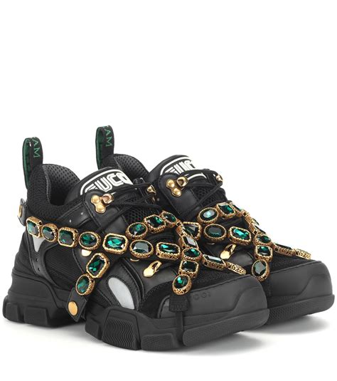 gucci sneakers with chains.